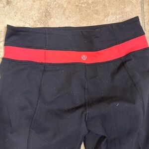 lululemon athletica Leggings in Black with Red Band- size 6- great condition!